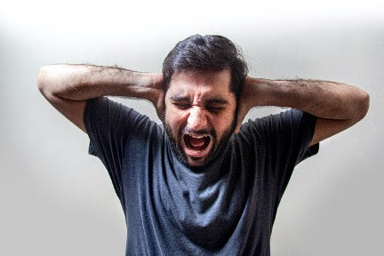 Man suffering from hyperacusis