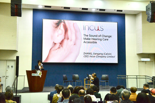 Incus CEO on stage during World Hearing Day 2025